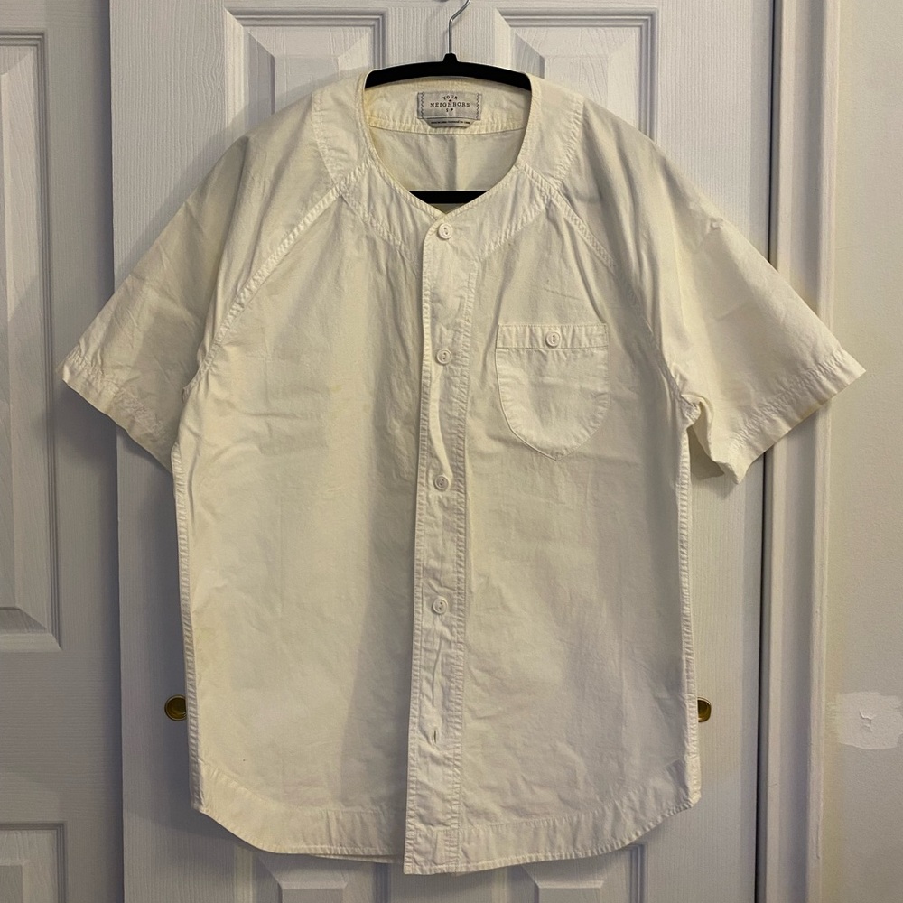 White baseball shirt size small.